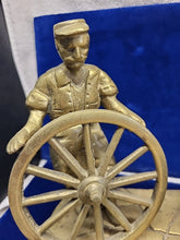 Load image into Gallery viewer, Vintage Brass Sculpture of a Blacksmith with A Wagon Wheel