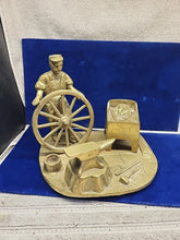 Load image into Gallery viewer, Vintage Brass Sculpture of a Blacksmith with A Wagon Wheel
