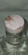 Load image into Gallery viewer, Vintage St. Pierre Smirnoff Embossed Crown Clear Glass Liquor Bottle Flask 7”
