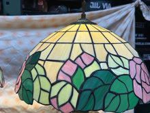 Load image into Gallery viewer, Really unique pair of vintage Tiffany style floor lamps with flower motif and iron bases
