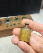 Load image into Gallery viewer, Antique Set of 10 Graduated Brass Weights in Wood Block
