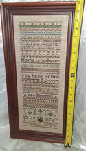 Load image into Gallery viewer, Vintage Framed Cross Stitch Sampler Home Is Where You Hang Your Needlework  1987
