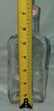 Load image into Gallery viewer, Vintage St. Pierre Smirnoff Embossed Crown Clear Glass Liquor Bottle Flask 7”
