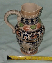 Load image into Gallery viewer, E25 Vintage West Germany Ceramic Relief Pitcher Cherub Floral Design 9.5” Ta
