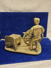 Load image into Gallery viewer, Vintage Brass Sculpture of a Blacksmith with A Wagon Wheel
