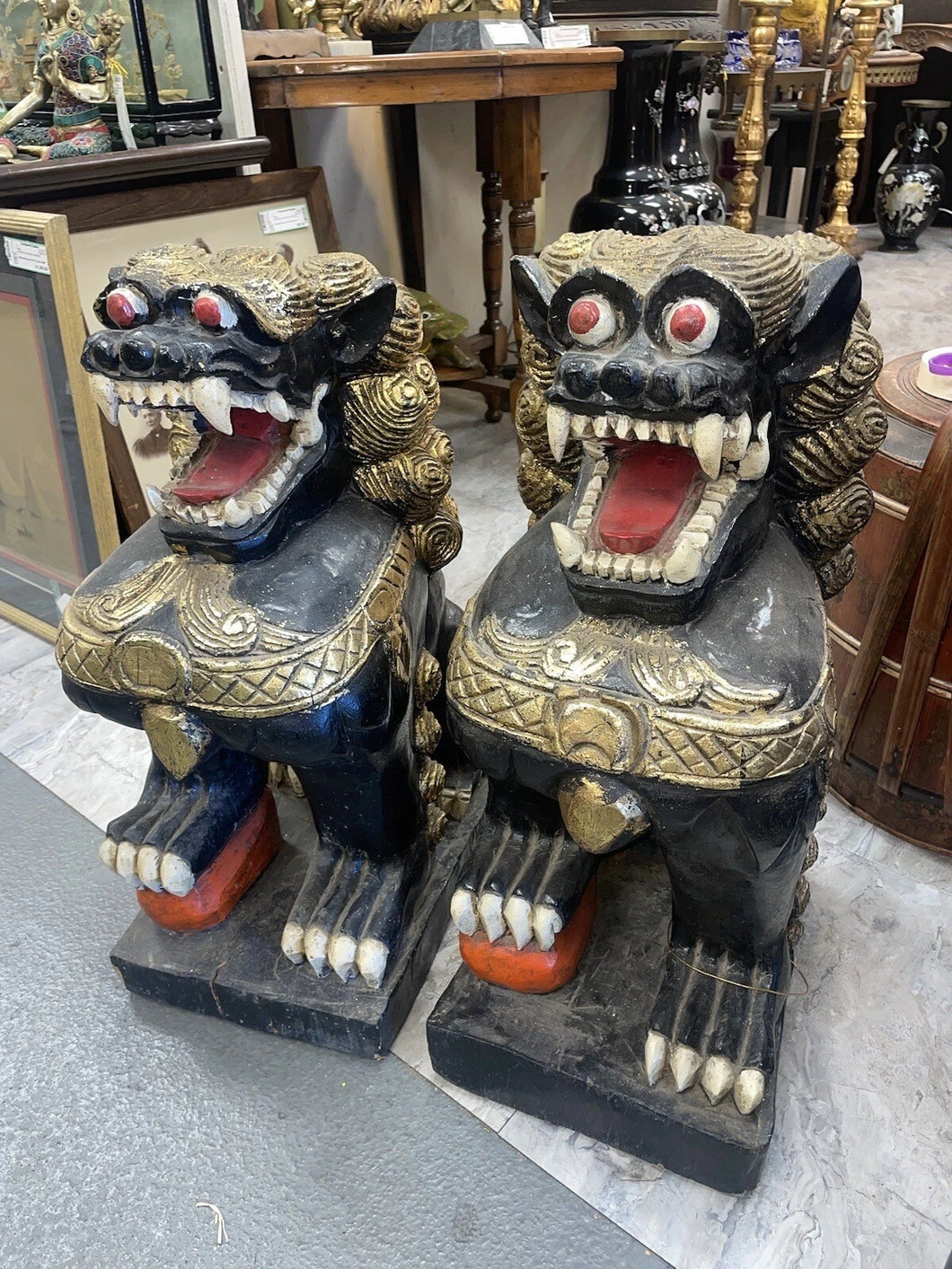 pair of Antique Japanese black lacquer wood Shishi or Foo Dogs