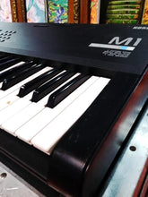 Load image into Gallery viewer, Korg M1 Music Workstation Synthesizer 61-Key w/ Road Case - Powers On
